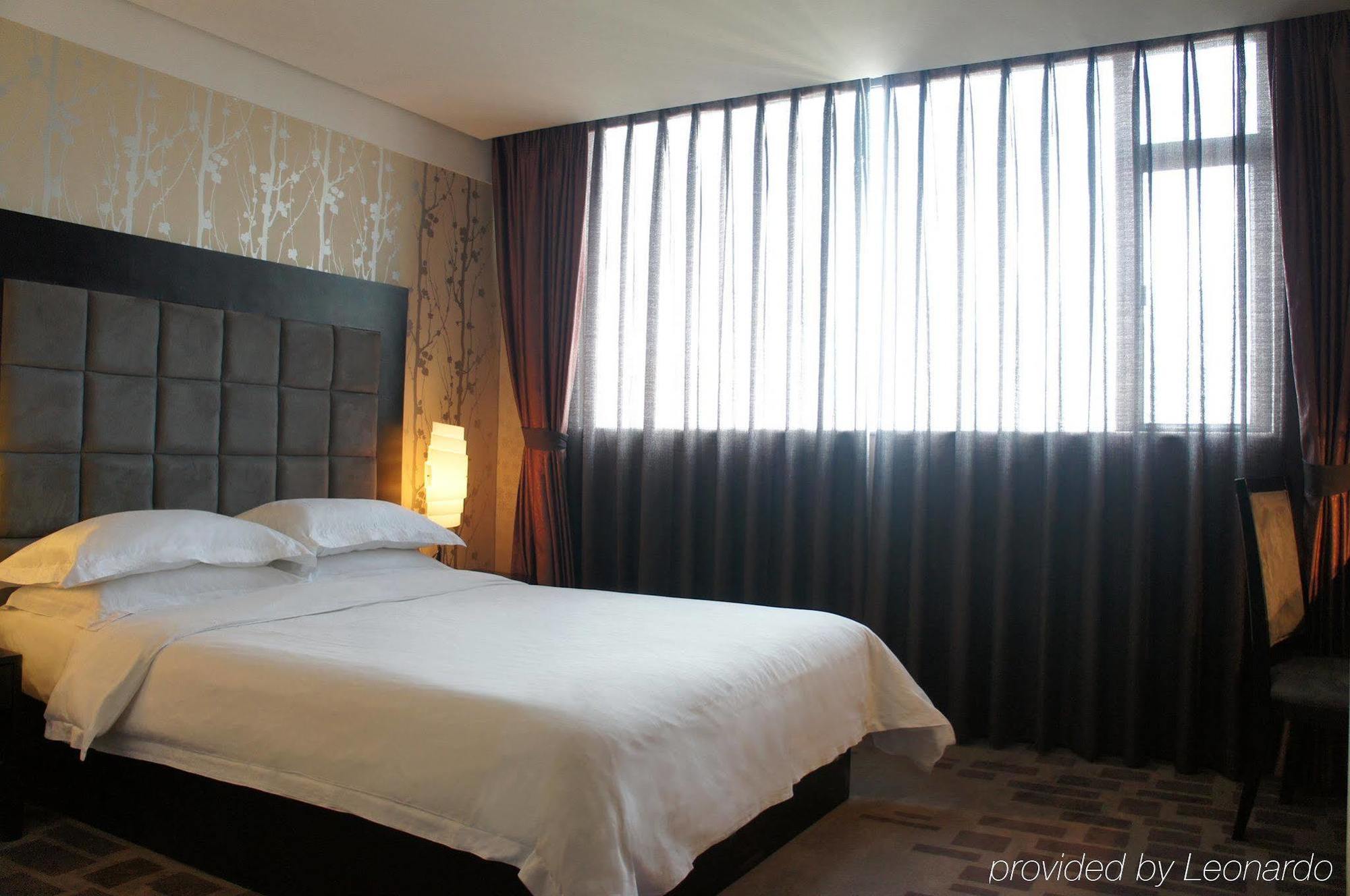 Henry Business Hotel Canton Extérieur photo